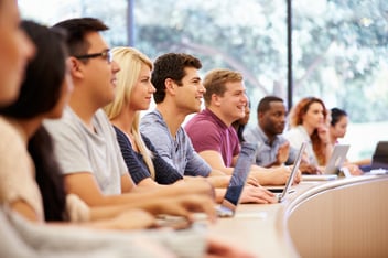 college students using laptops in the classroom