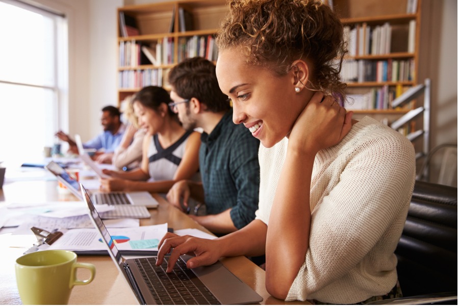 business-team-having-meeting-in-busy-office-picture-id508454788 (1)