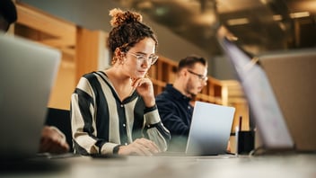 college-students-working-library-computer